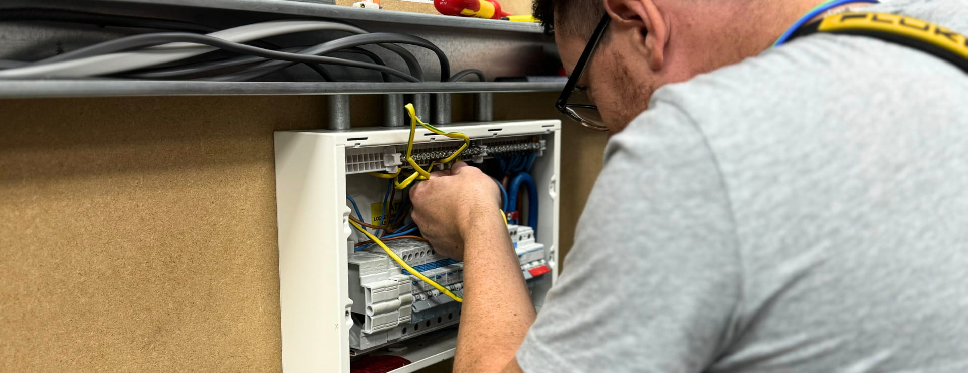 learning the electrical trade by safely wiring a electrical switch board