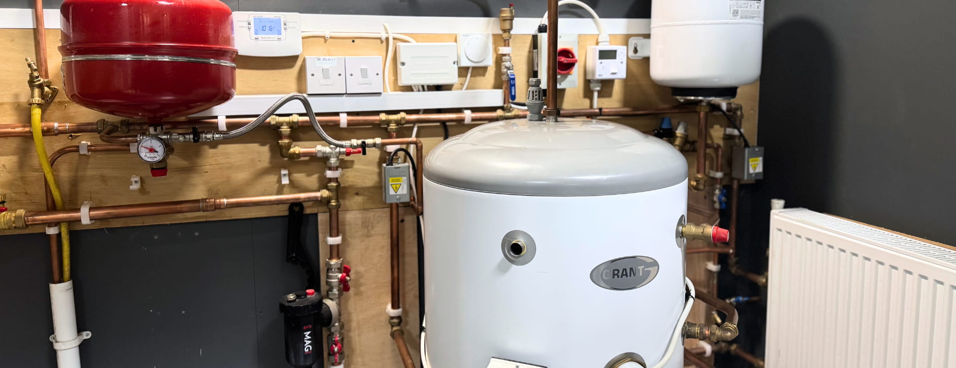 Hot water cylinder attached to a training rig