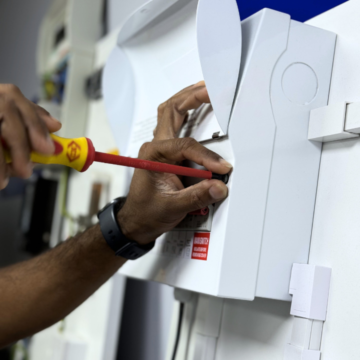 A Logic4training Part P student opening a domestic consumer unit