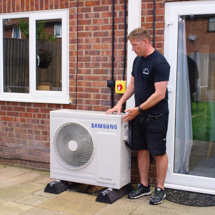 Alto Energy air source heat pump engineer commissioning a heat pump