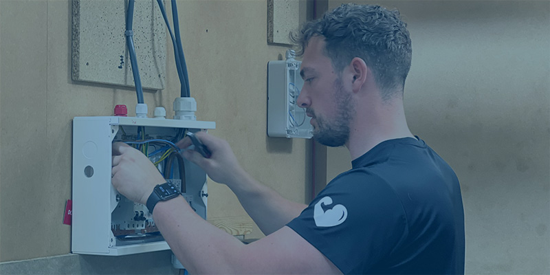 Man installing electrical box
