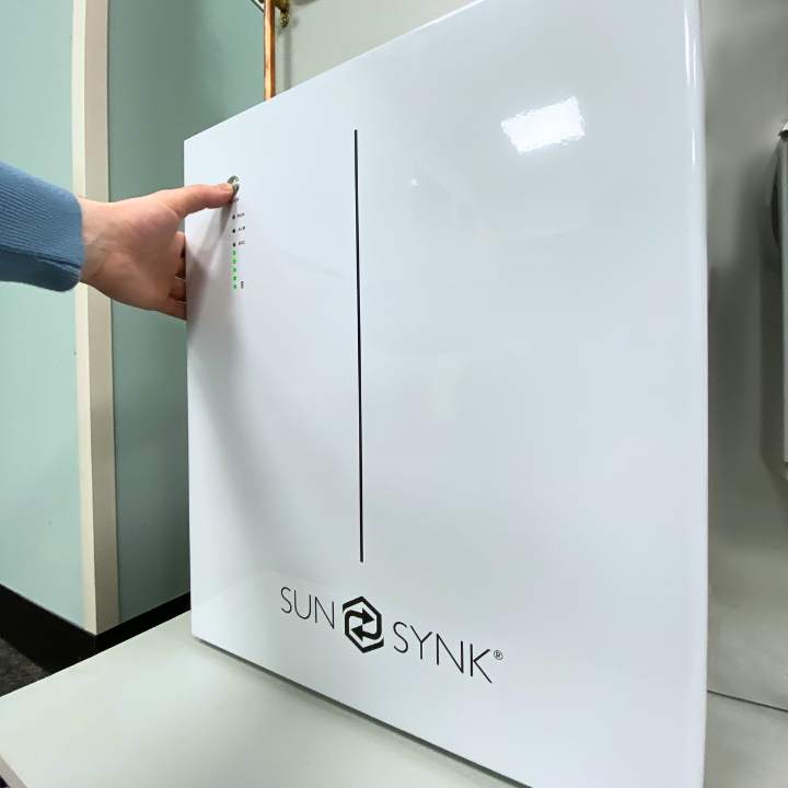 A Logic4training student turning on a battery storage unit