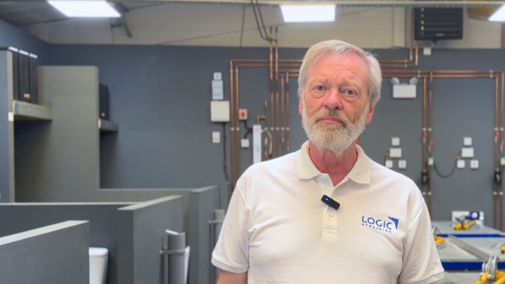 plumbing trainer explaining the course