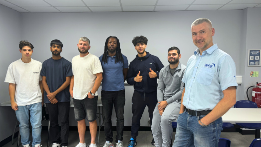 electrical students with their trainer