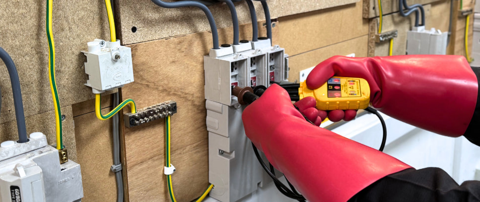 a smart meter student performing safe isolation of a cut out