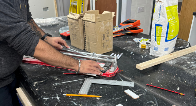 tradesman working on improving their customer service to meet their client expectations.