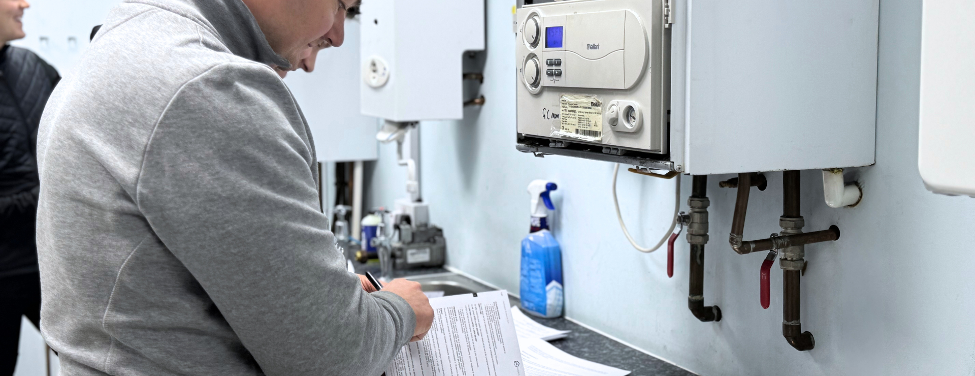 gas student working on a boiler at a training centre