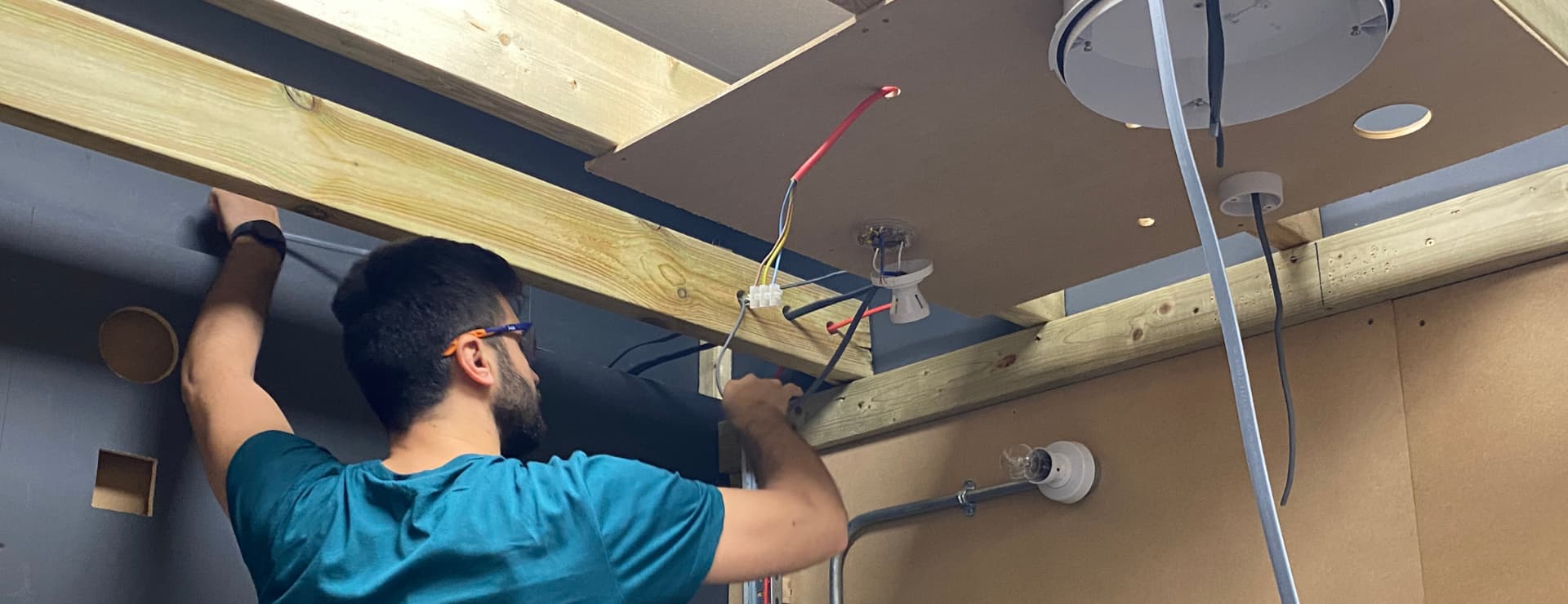 electrical student training to rewire a house