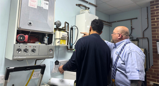 An apprentice and expert gas trainer working to complete the students gas apprenticeship