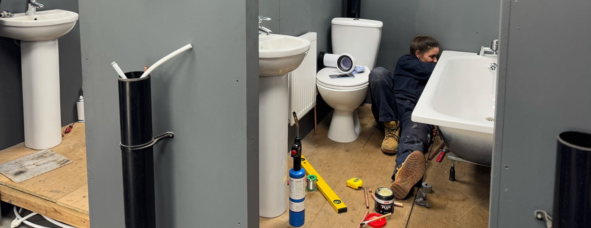 An apprentice using their practical skills, something that isn't learnt at university and is a reason why an apprenticeship can be better than university