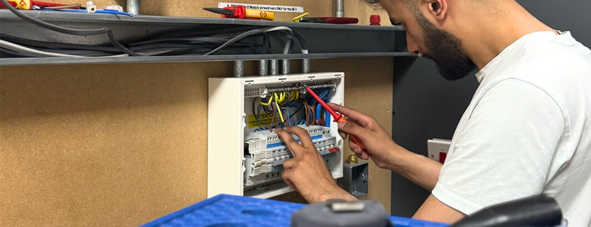 An electrical student carrying out their training with Logic4training