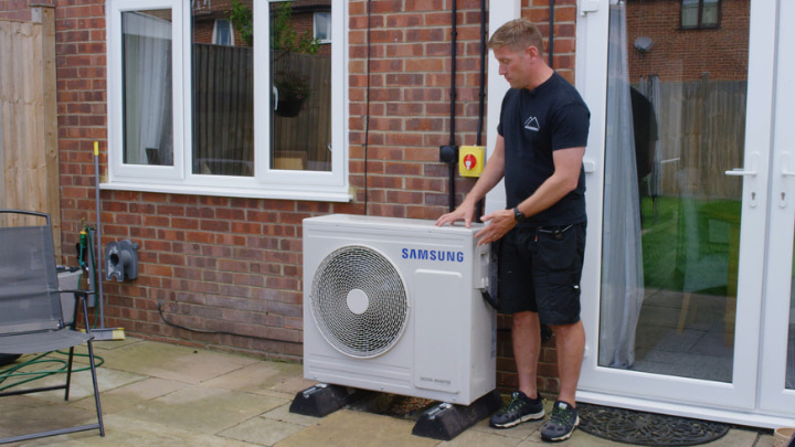 Alto Energy engineer after installing a heat pump
