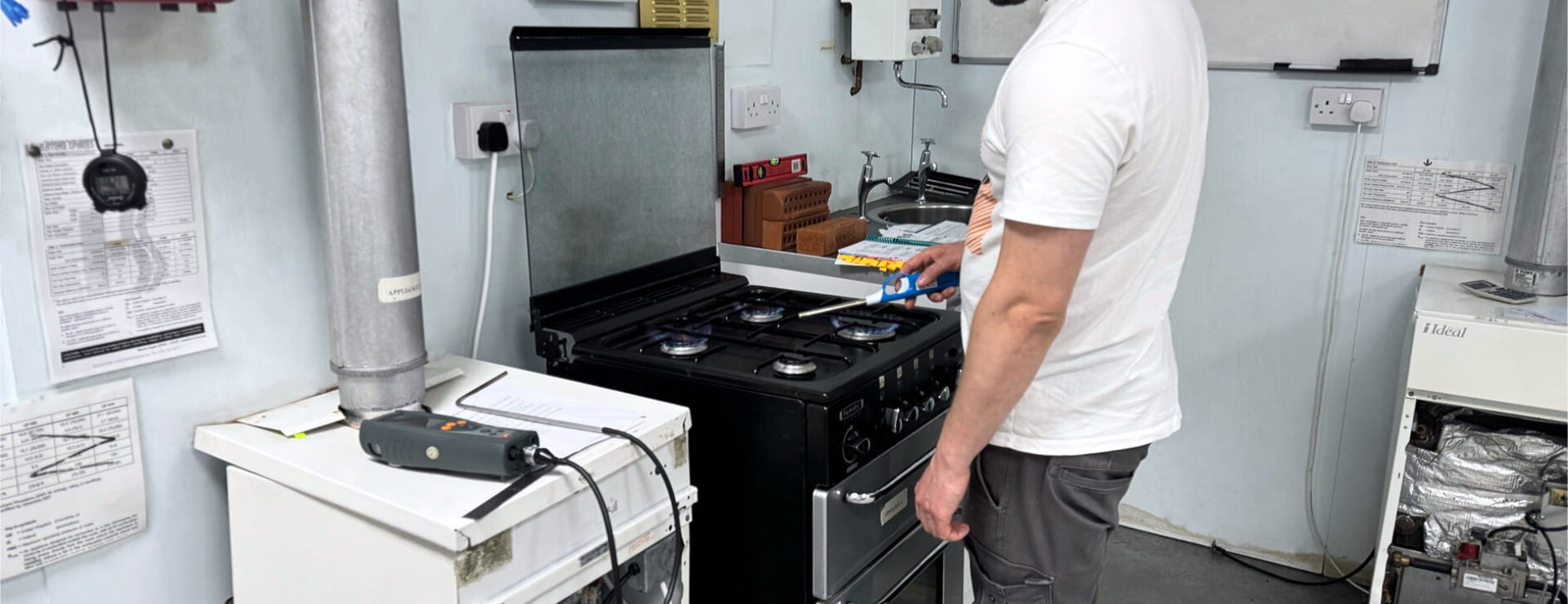 Gas student working on a domestic gas cooker appliance