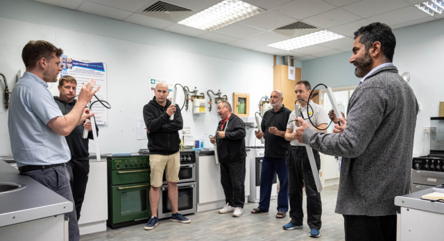 Gas trainer teaching gas students in a gas workshop