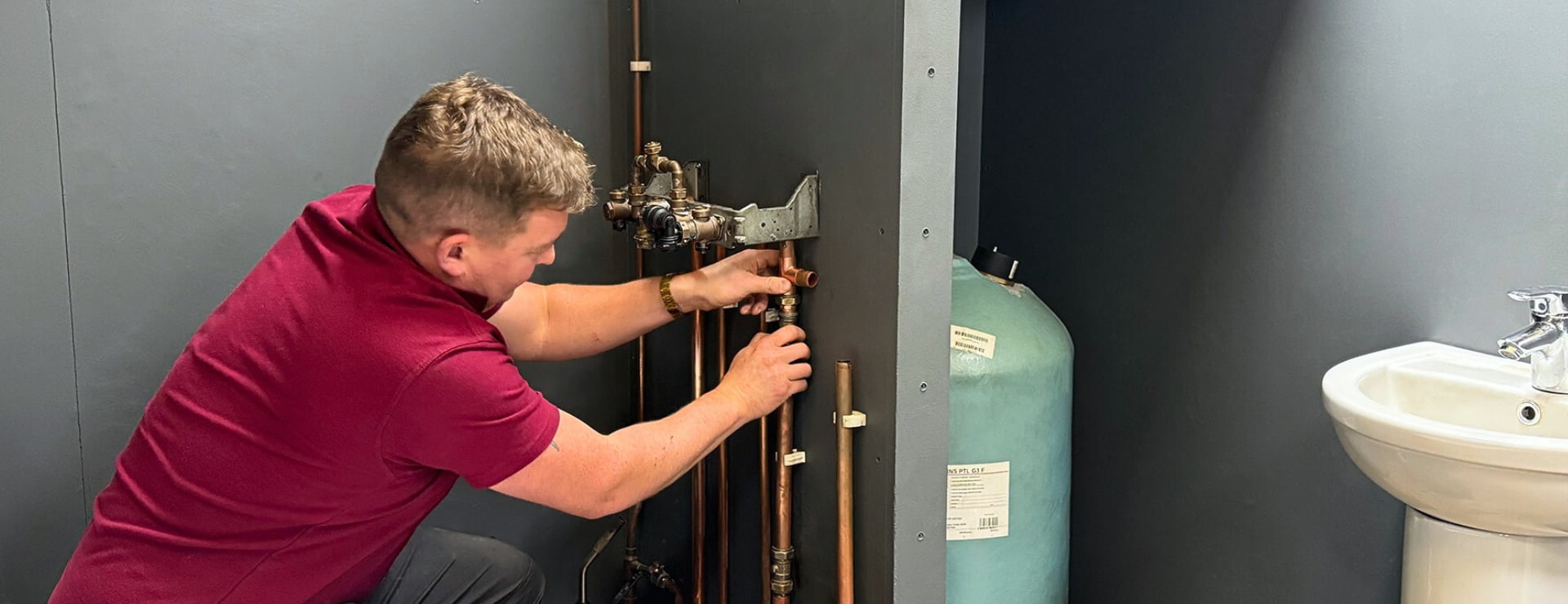 Plumbing student learning their trade with Logic4training to enter the construction and building services industry