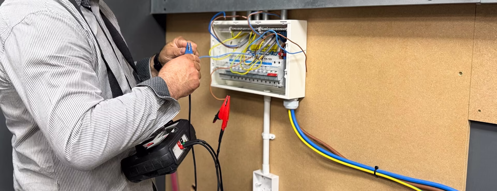 A Logic4training electrical student testing their work to prepare for their AM2 assessment