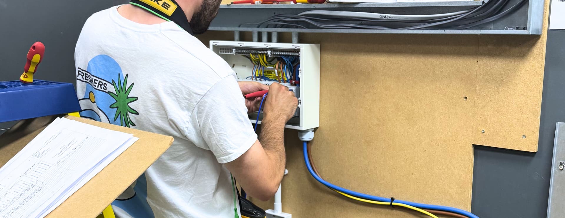 A Logic4training electrical student work to complete their electrics course