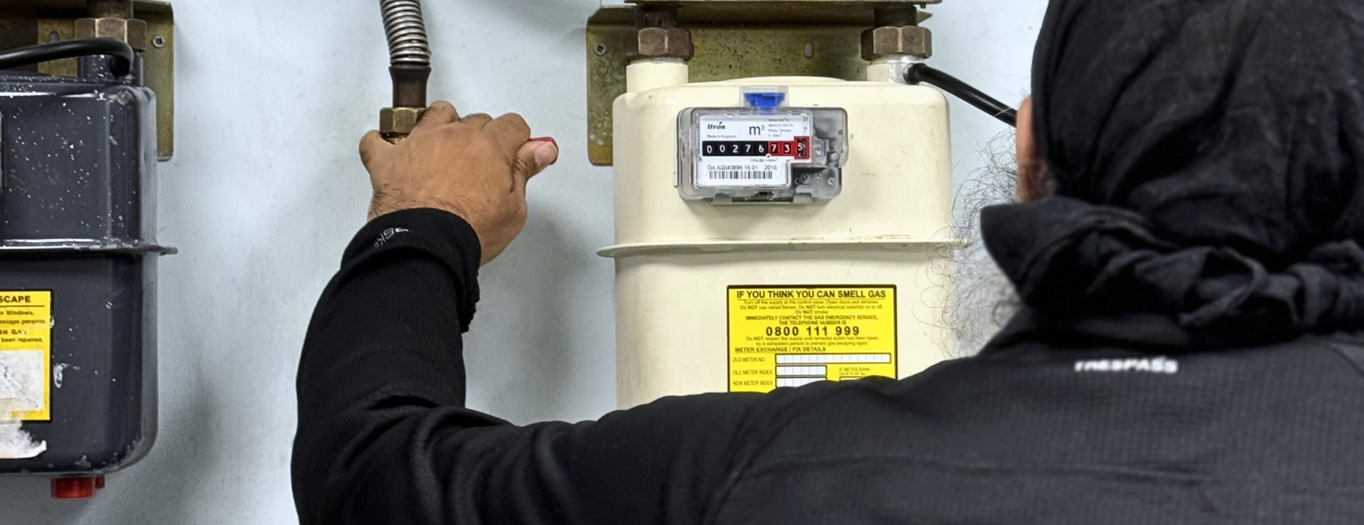 A Logic4training student working on a gas meter
