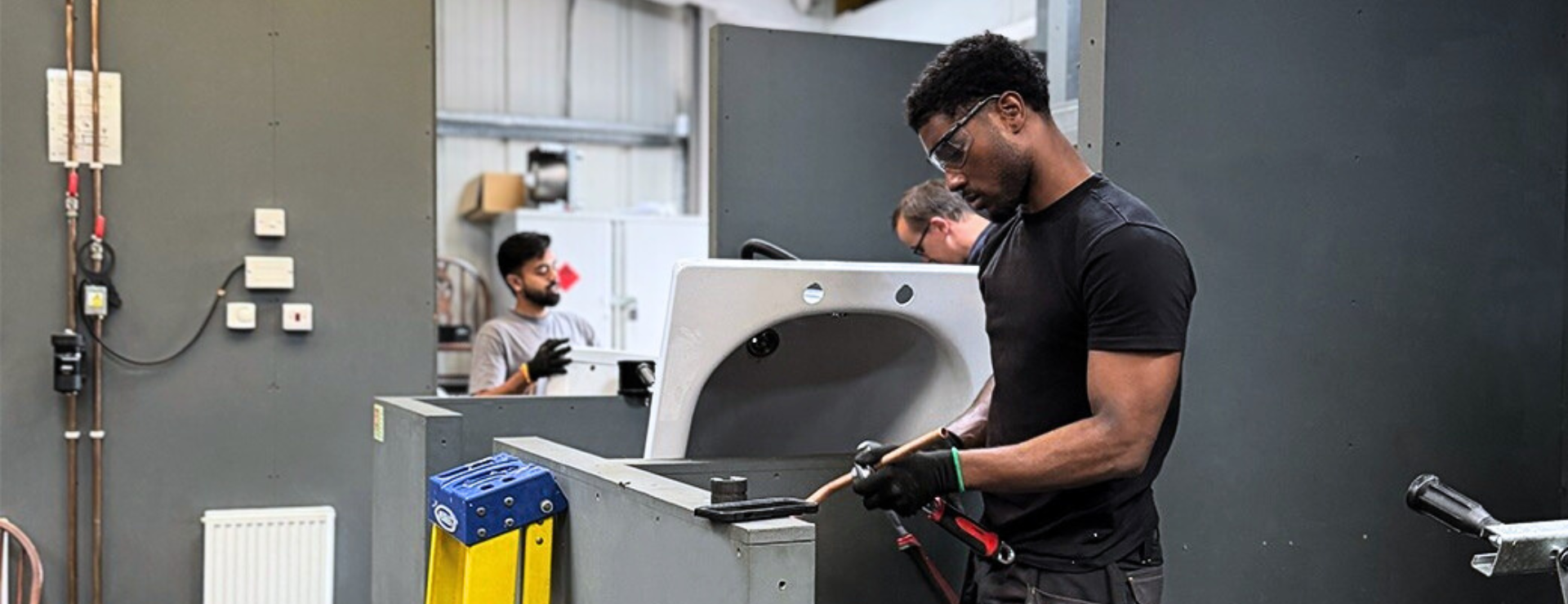 A young person completing plumbing training at Logic4training as part of their new career choice