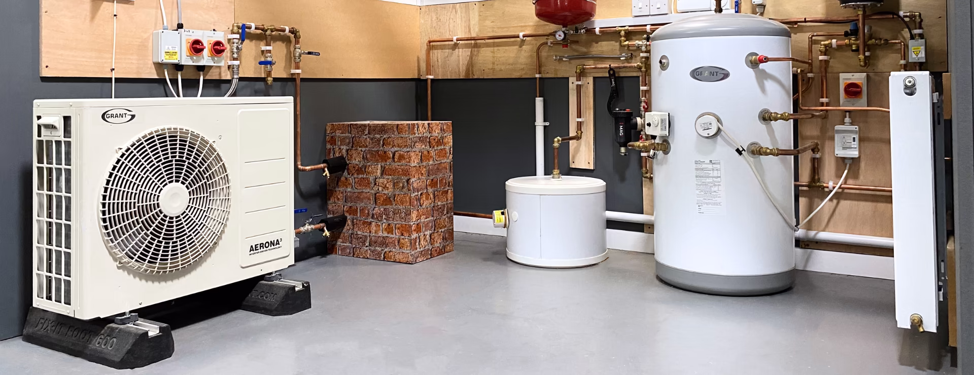 Air source heat pump and hot water cylinder installation used for BUS‑ready heat pump training at Logic4training