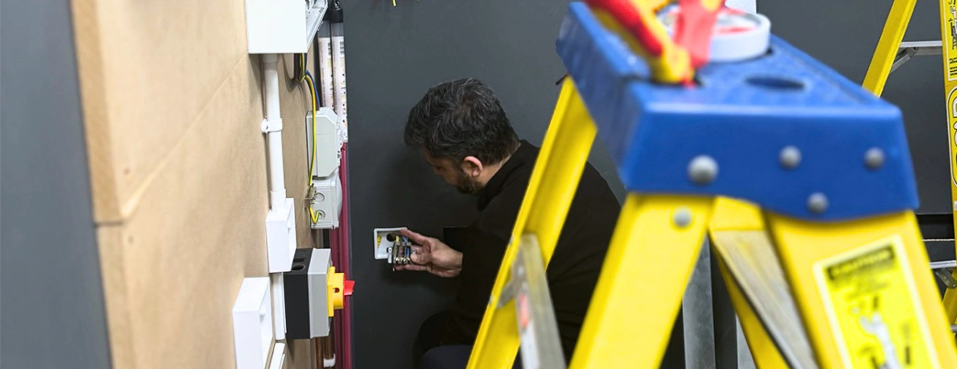 an experienced worker assessment electrical student completing their qualification