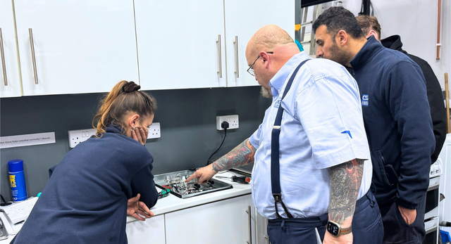 A Logic4training Gas Apprenticeship where the trainers is teaching the cohort about a gas hob