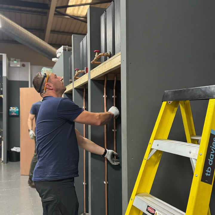 A Logic4training plumbing student training in their centre
