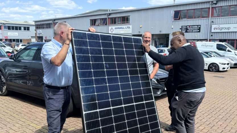 A Logic4training solar pv class working on a solar panel as part of their renewable technologies course