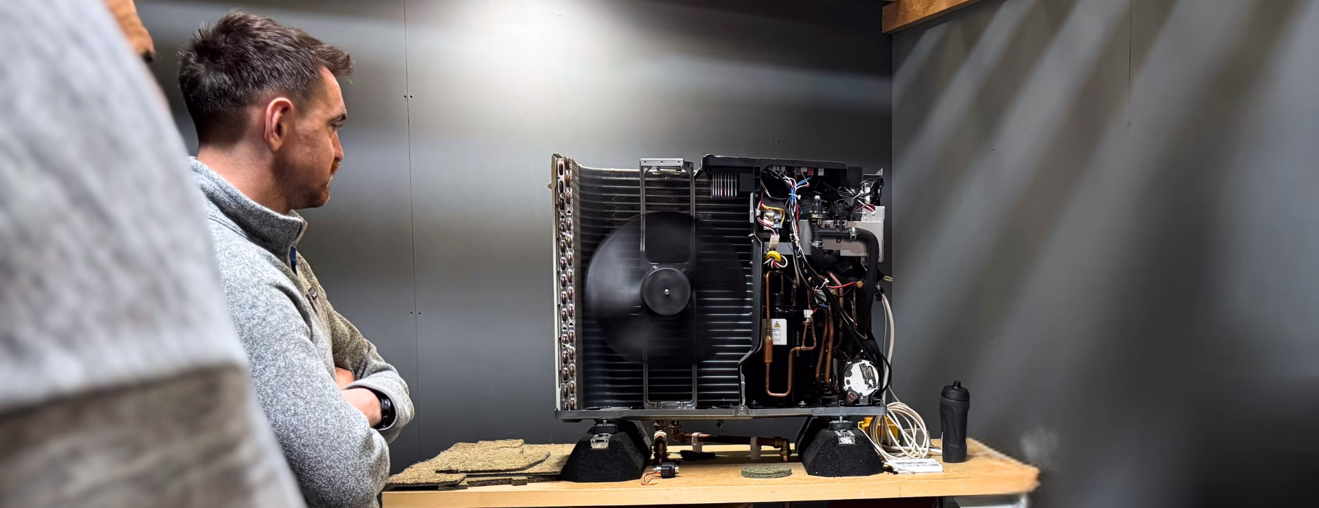 Logic4training air source heat pump candidates learning the internal components of an air source heat pump