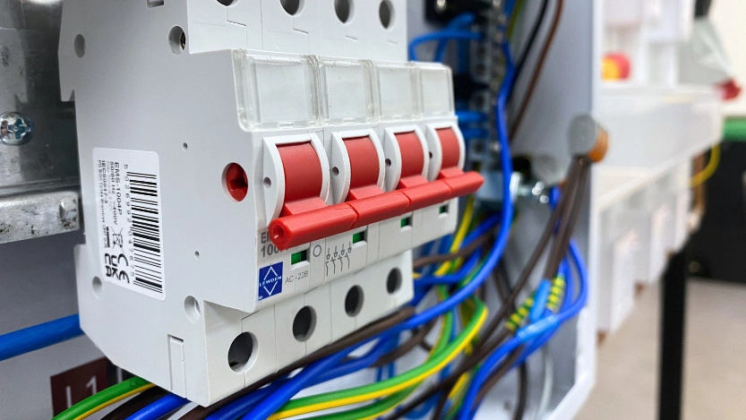 a row of RCDs and electrical wires that are part of Logic4training's Wiring Regulations Course