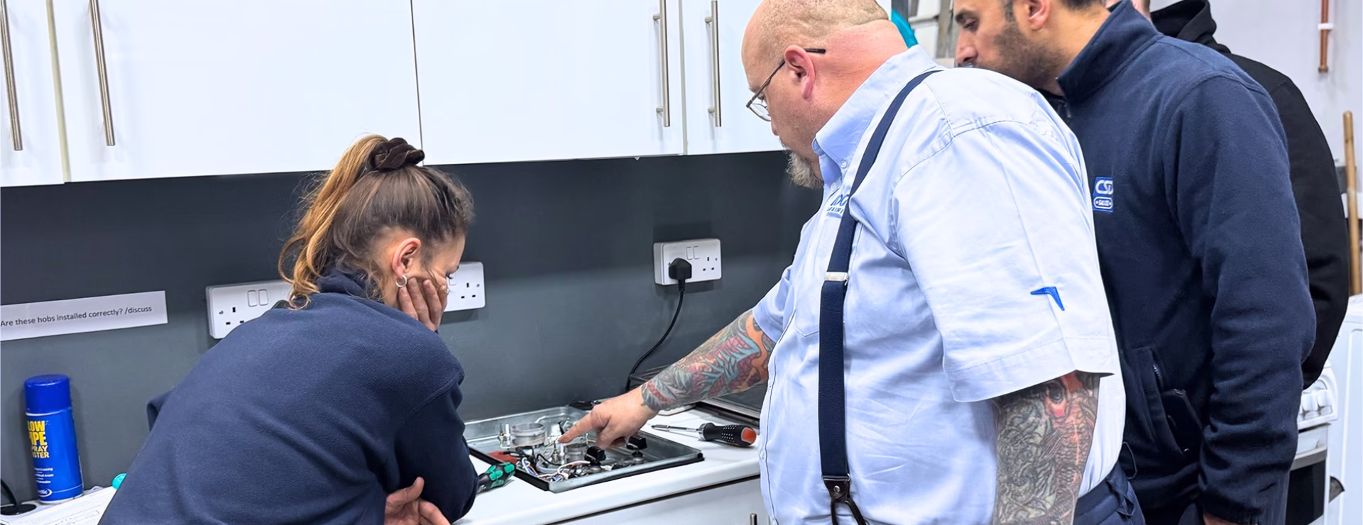 A Logic4training gas apprenticeship group learning how a a hob works