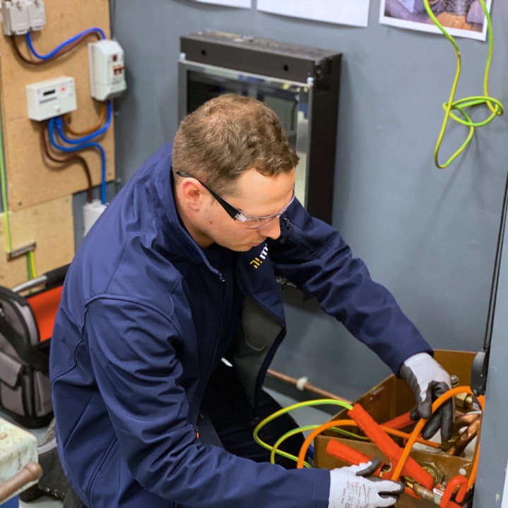 A power fuel smart meter candidate learning how to work on a meter